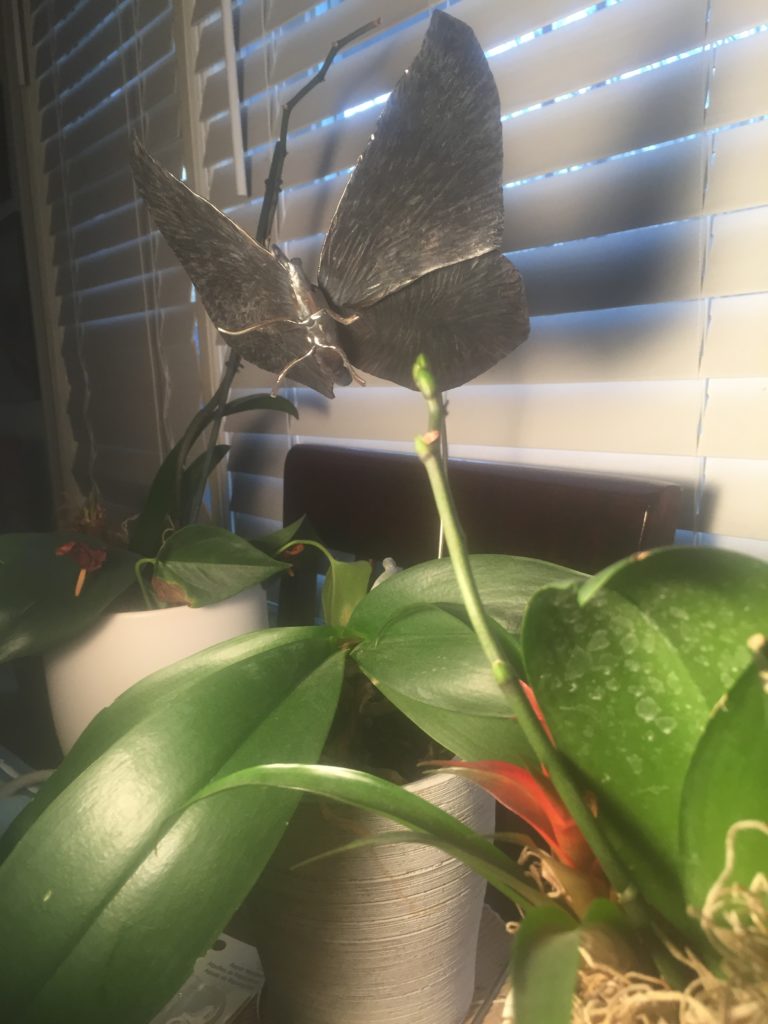 Metal Art Sculpture Monarch Butterfly in Flight in Orchid Garden